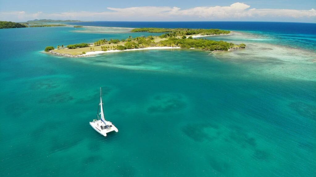 Amavi catamaran near the Roatan coastline