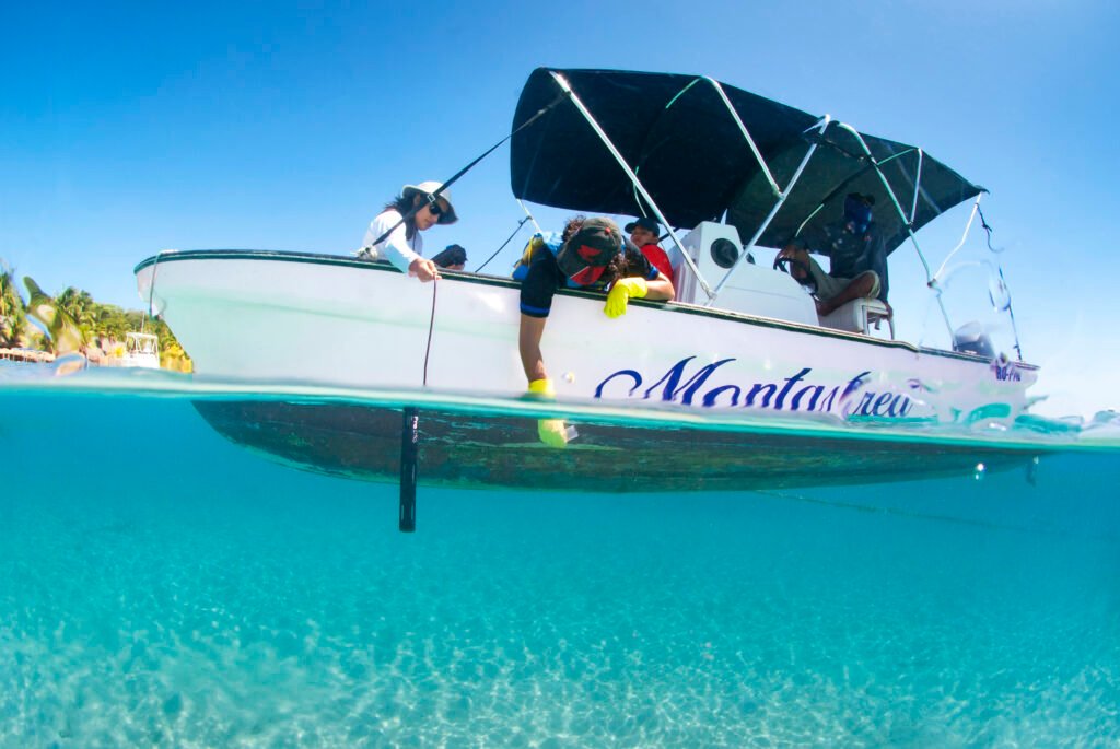 BICA Roatan team working from a boat