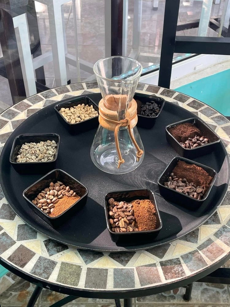 Coffee bean selection on a table at Bad Ass Java